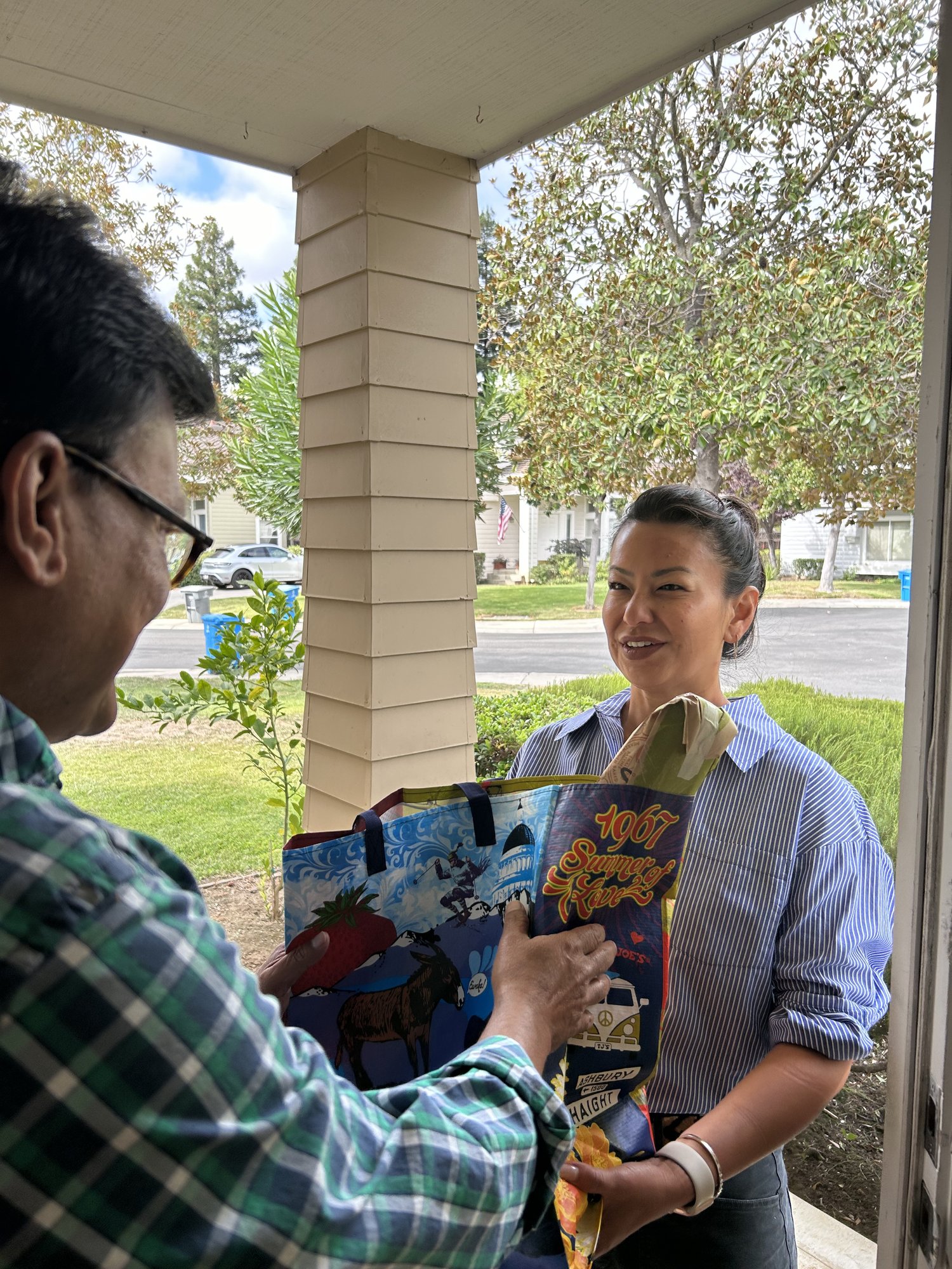 Jenny delivering groceries to Sudeep