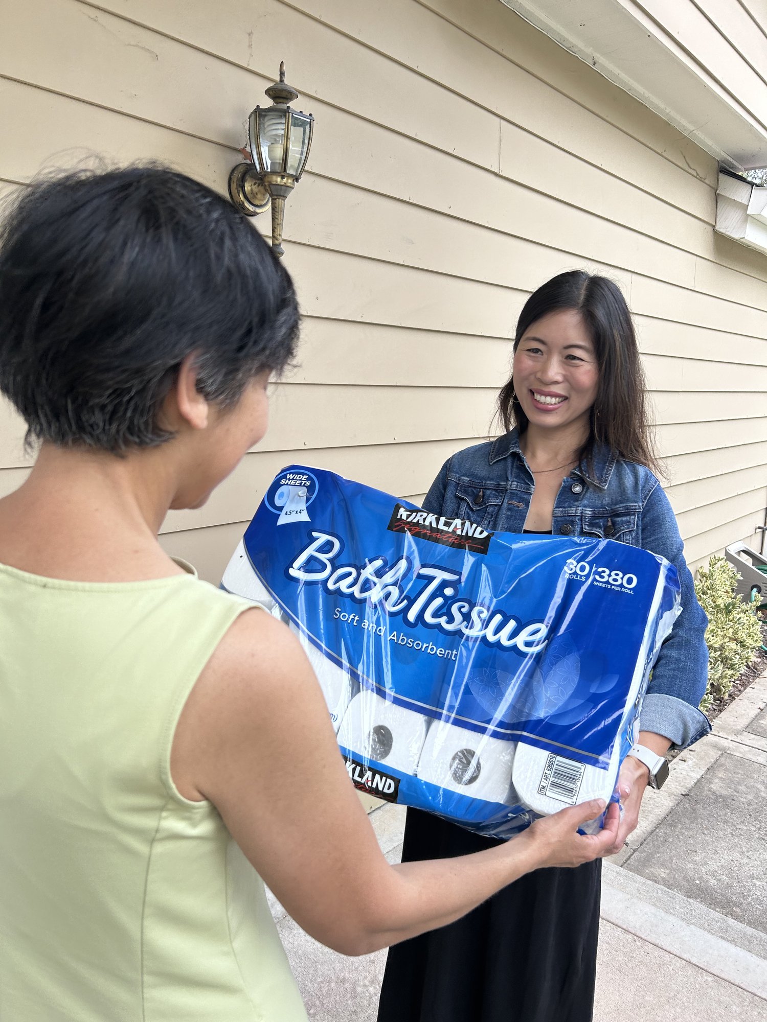 Eunice delivering Costco item to Mousumi